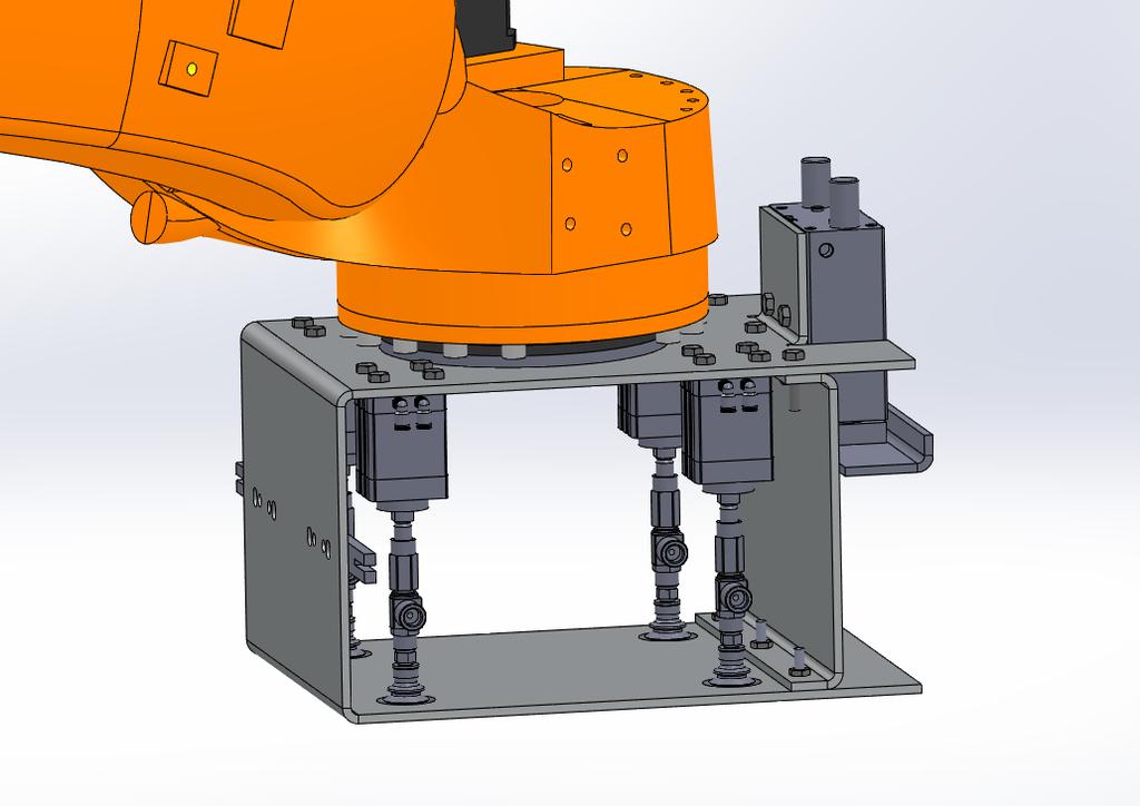 9 Kuva 3. Tarttuja solidworksissa Tuotteen tartunnassa tarvittiin puristuksessa pinta-alaa, jottei tuotteisiin kohdistu puristaessa niin suuri paine, että tuotteeseen jäisi jälkiä.