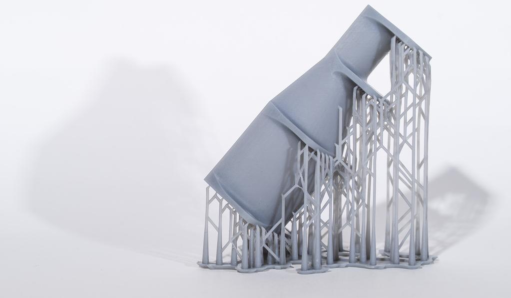 28 Kuva 10. SLA -tuloste, jossa tukirakenne kiinni (3DHubs 2018g). Pyöristykset ovat yleinen osa kappaleen suunnittelua.