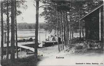 Idyllinen iltamaisema Knorringien rannasta. Huvilan ja viereisen sivun kortin kuvan alahuvilan rakennutti kuvernööri von Knorring, paikallisille asukkaille Norrinki.
