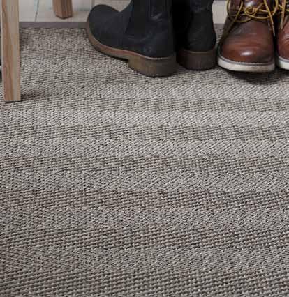 Sisal s gloss and the traditional herringbone give the Barrakuda rug a