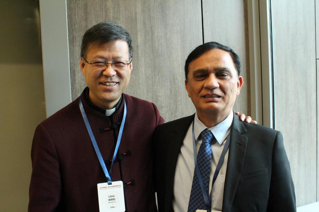 Katolisen yliopiston professori Limin Wang Kiinasta (vas.