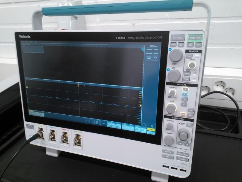 36 Figure 22. Oscilloscope used in measurements. The saved time domain data from oscilloscope needed to be modified, so the measured response for different frequencies could be plotted.