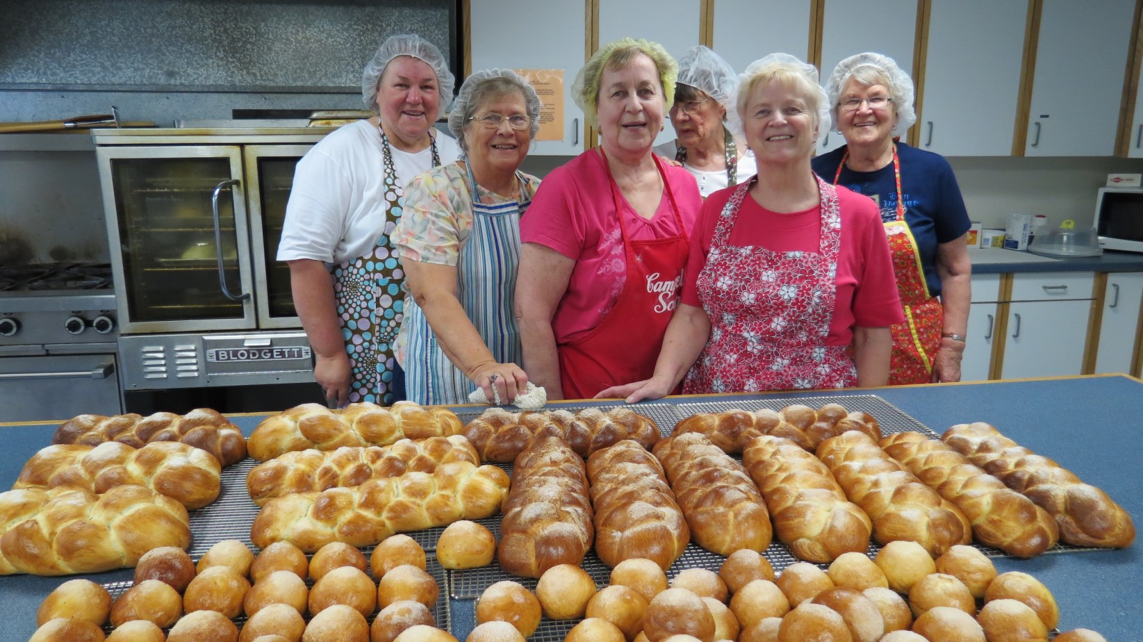 Ladies Auxiliary News / Naisjaoston Kuulumisia Finnish Coffee Bread `Pulla`` has been one of the best fundraising undertakings and in the picture you will see the 10,000 th pulla being baked by our