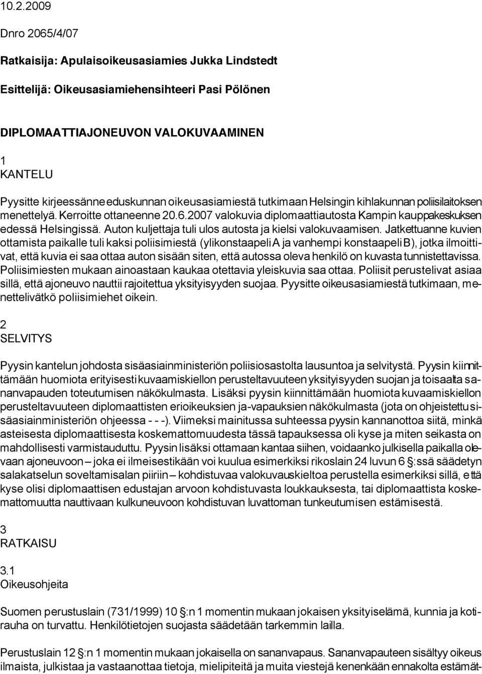 Auton kuljettaja tuli ulos autosta ja kielsi valokuvaamisen.