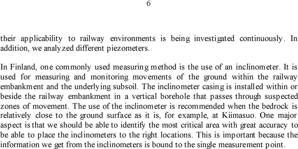 The inclinometer casing is installed within or beside the railway embankment in a vertical borehole that passes through suspected zones of movement.