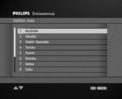 6 Sen jälkeen esiin tulee näyttö, jossa voit valita kielen. Korosta valitsemasi kieli painamalla ensin V/W-näppäintä ja valitsemalla sitten OK.