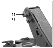 Replacing the sanding belt (Fig. 9) Undo knob (I) and remove the protective cover (J). Loosen locking knob (K) and move the top adjustable pulley (L) to release the belt tension.