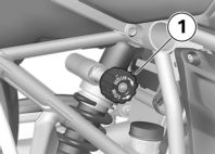 4 66 Käyttö z Näppäin 2 on lukittu. Jousen esijännitys Säätäminen Jousen esijännityksen takapyörällä tulee vastata moottoripyörän kuormaa.