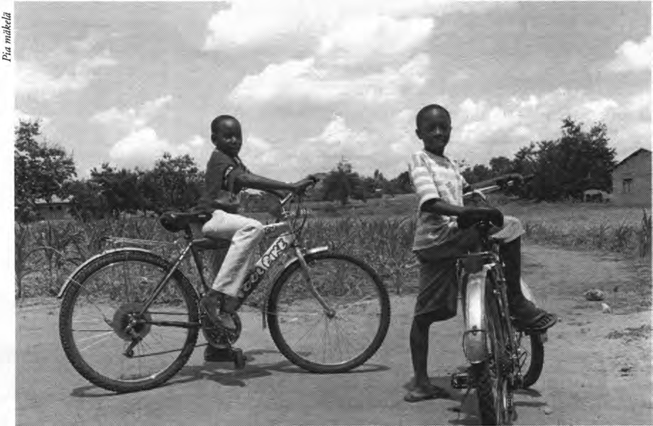 Uhusiano Newsletter 1/2003 I wake up at 6 o'clock everyday morning. Firscly, I wash my face, brush my teeth and wash my body. Afi:er putting up my school uniforms, I go for my breakfast.