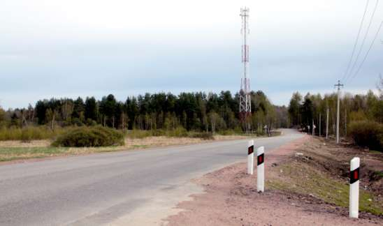 Runsaan kilometrin päässä Talin sillalta Karisalmea kohti kääntyy risteys vasempaan Talinmyllylle ja Ihantalaan. Risteys on oikealla yläkuvassa olevan maston takana.