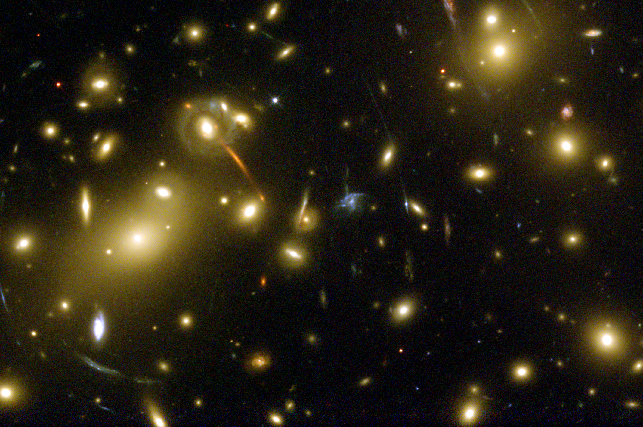 1 Johdanto 1.1 Motivaatio Kuvio 1. Hubble-teleskoopin kuva galaksiklusterista Abell 2218. NASA/ESA.
