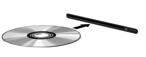 Paina levy (3) varovasti levykelkassa olevaan pyörittimeen siten, että se napsahtaa paikalleen. 6. Sulje levykelkka.
