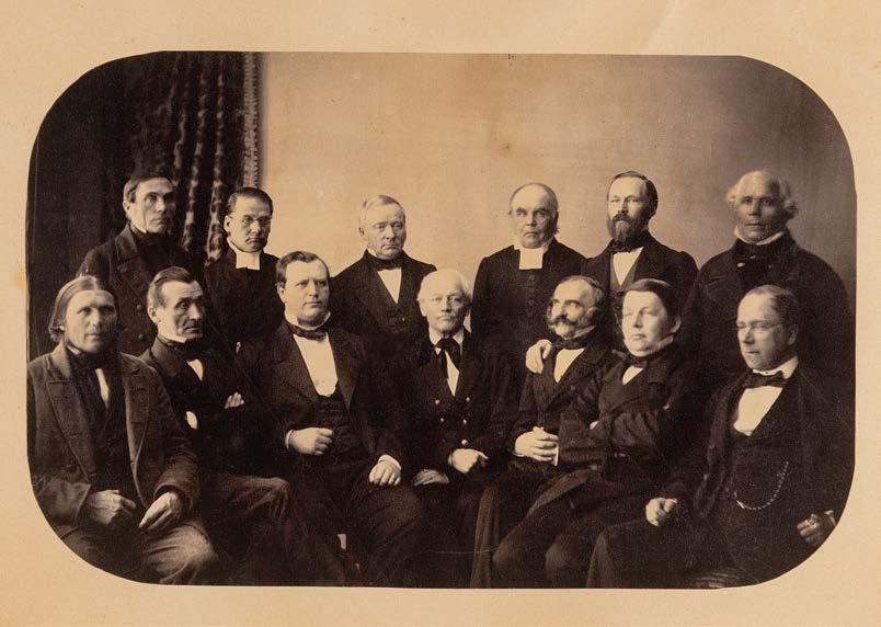 Takarivissä vasemmalta: / Bakre raden från vänster: A. G. Tolpo, T. T. Renvall, J. W. Snellman G:son, D. Lindh, C. M. Creutz, H. Duffa.