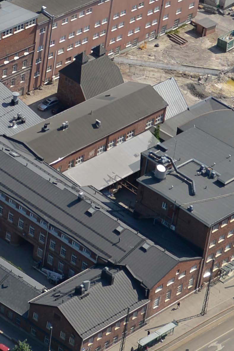 ystyyn jäävästä ulkoseinästä tulee asuntopihoja rajaava muuri, joka tuetaan uusin kohtisuorin, asuntopihojenvälisin muurein. 4 Konepajan laajennus (Rajasampaanranta) Rakennusvuosi 1921.