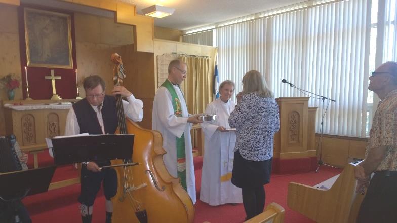 Pauli Pietiläinen, who is both a cantor from the Sibelius Academy and an ordained pastor was giving the communion with Pastor Nina on May 28.
