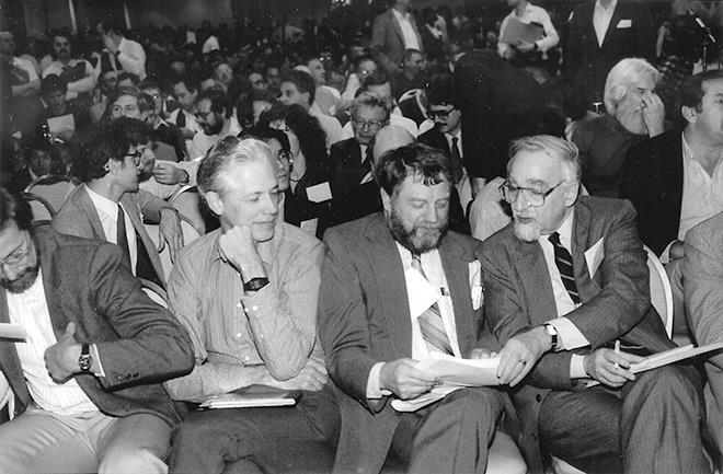 Woodstock of Physics 1987: Thousands of physicists crowd a ballroom at the New York Hilton for a hastily arranged marathon session on high-temperature