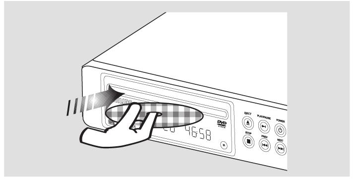 Käyttö Peruskatselu 1 Paina etupaneelin POWER-näppäintä DVD-soittimen kytkemiseksi päälle. 2 Syötä haluamasi levy soittimeen etikettipuoli ylöspäin.