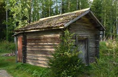 suurempi, kooltaan jo kesämökkimäinen ja 1960-luvulta, pyöröhirrestä.