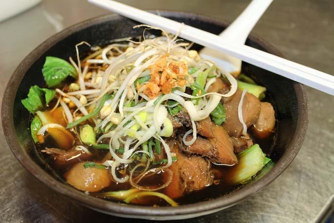 Braised beef chuck steak in a traditional Thai herbal broth with rice noodles, beef meatballs, bean sprouts, coriander, leek, pak choi and Chinese water spinach.