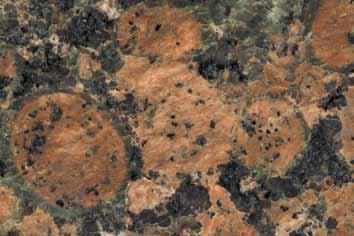 Tyypillinen rapakivigraniitti, jossa esiintyy plagioklaasikehällisiä kalimaasälpärakeita. C. Porfyyrisessä graniitissa tavataan muuta raekokoa suurempia kiteitä. D.