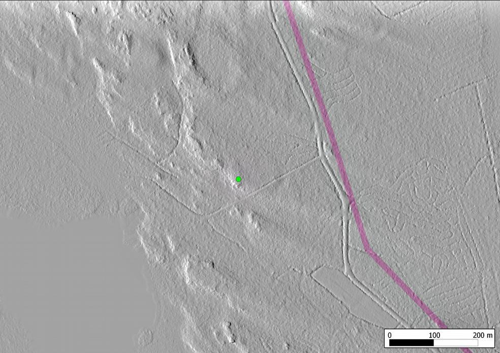 000, 6/. Röykkiö lidar-vinovalovarjosteessa.
