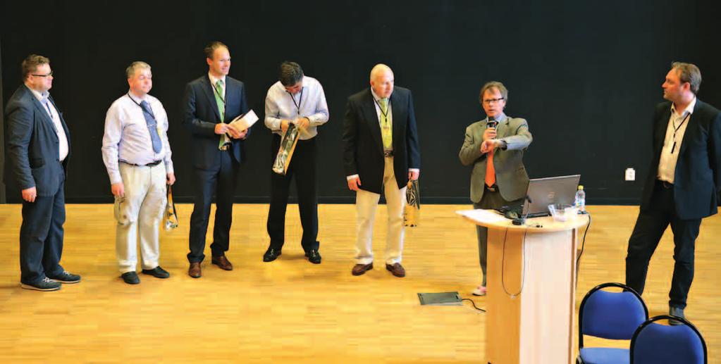 Symposiumin luennoitsijat vasemmalta Peters Brangulis, Peter Lyckberg, Thomas Hainschwang, Geoffrey Dominy, John I. Koivula, Conny Forsberg ja Jan Asplund.