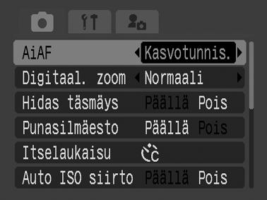 Siirtyminen tarkennustilojen välillä Tarkennusruutu ilmaisee kuvan alueen, johon kamera tarkentaa. Voit valita jonkin kolmesta alla mainitusta tarkennusmenetelmästä. (Ei tarkennusaluetta) Kasvotunnis.