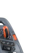 Soft drive -painike 4 Etunostolaitteen ja etukuormaimen vaihtokytkin 5. Joystick 6.