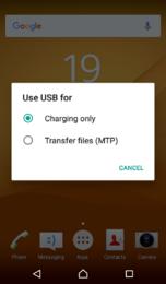 Laitteen päivittäminen tietokoneella 1 Kytke laite tietokoneeseen USB-kaapelilla.