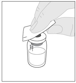 4. Pyyhi injektiopullon yläosa pakkauksessa olevalla alkoholipyyhkeellä (F) ja anna sen kuivua.