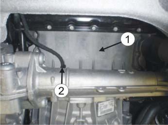 4 5/5 Dismount the rear cover under the car. Thoroughly clean the area where the heater is to be placed (1). Move the cable clip (2) to the outer rib (3). Remove the bolt (4) from the oil sump.