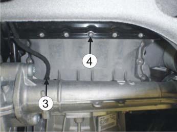 Refit the enclosed bolt (6), lock washer, bracket (7) and spacer on the hole for the original bolt (4) on the oil sump. Tighten the bolt (6) and ensure that the heater fits well. Note!