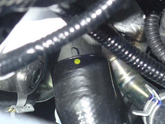 Remount the original spring clamp. Note! Do not tighten the hose clamp on the heater.