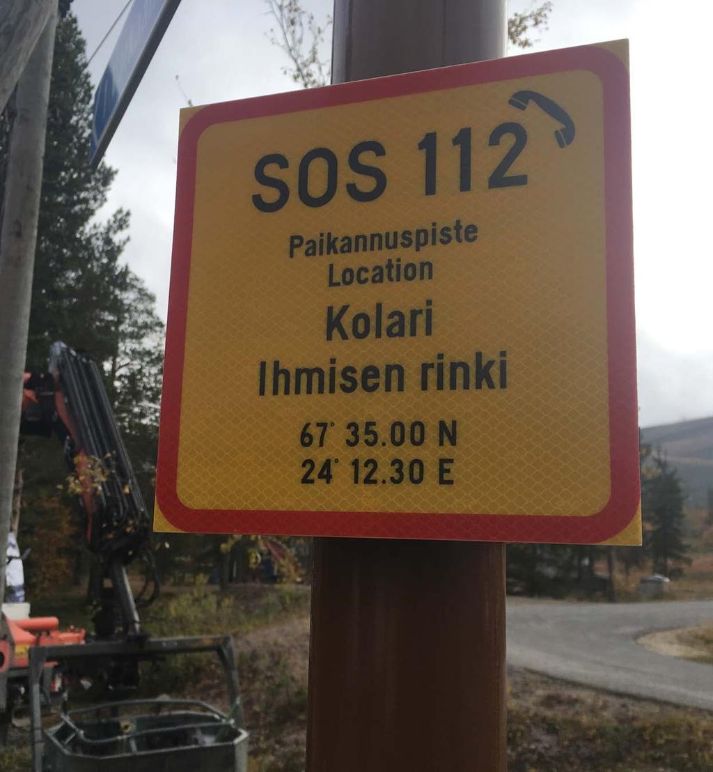 Paikannusmerkki Ihmisen Rinki -nimisellä reittien lähtöpaikalla.