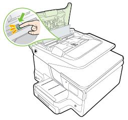Työnnä automaattisen asiakirjansyöttölaitteen keskellä olevaa vihreää vipua. 3. Vedä paperi varovasti ulos telojen välistä.
