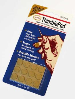 Thimble pad eli sormustintassu apuväline käsityöläiselle, kun sormenpäät ovat koetuksella Sormustintassu on pieni