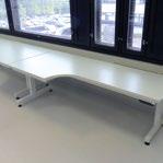 All table frames are part of the same mounting system.