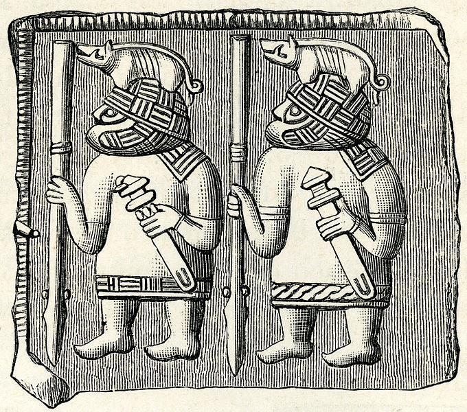Öölannista Torslundan pitäjästä löydetyssä metallilaatassa on kuvattuna sotureita, joiden kypärää koristaa villisika-aihe.
