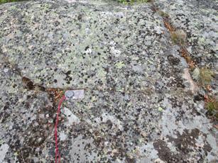 GEOTECHNICAL REPORT 8 A B Figure 6. A. Diagonal fracturing in Kökar granite. Photo: Olavi Selonen. B. Sound Kökar granite with orthogonal fracturing.