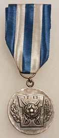 596 597 598 596 Upseeriliiton ansiomitali / Medal of Merit