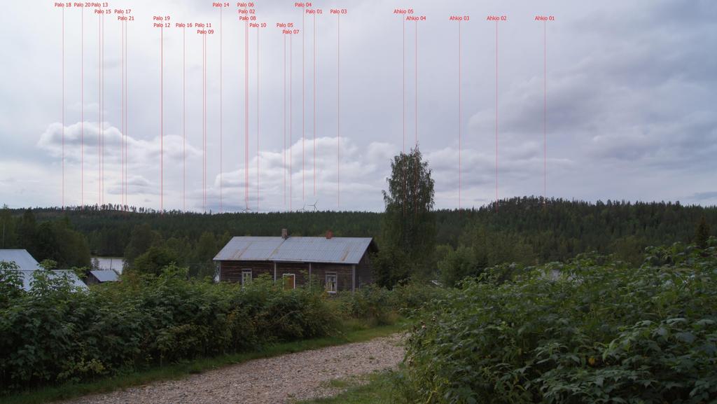FCG FINNISH CONSULTING GROUP OY VE1, VE2 ja VE3 21 (67) Kuvauspiste 11. VE2. Valokuvasovite Ajankijärventie 167. Voimaloiden kokonaiskorkeus on 230 metriä, kameran objektiivi 18 mm.