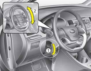 Autosi ominaisuudet OTA040025 Käsitoiminen Muuttaaksesi ohjauspyörän kulmaa paina lukitsinvipu (1) ala-asentoon, säädä oh - jauspyörä haluttuun kulmaan (2) ja vedä sitten lukitsinvipu yläasentoon