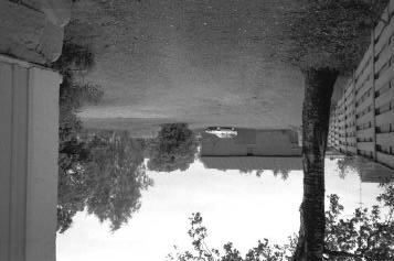 Ennen vuoden 0 suurpaloa Reiponkadun linja kulki kuvassa oikealla keskellä näkyvän puiden ja pensasaidan ympäröimän parkkipaikan