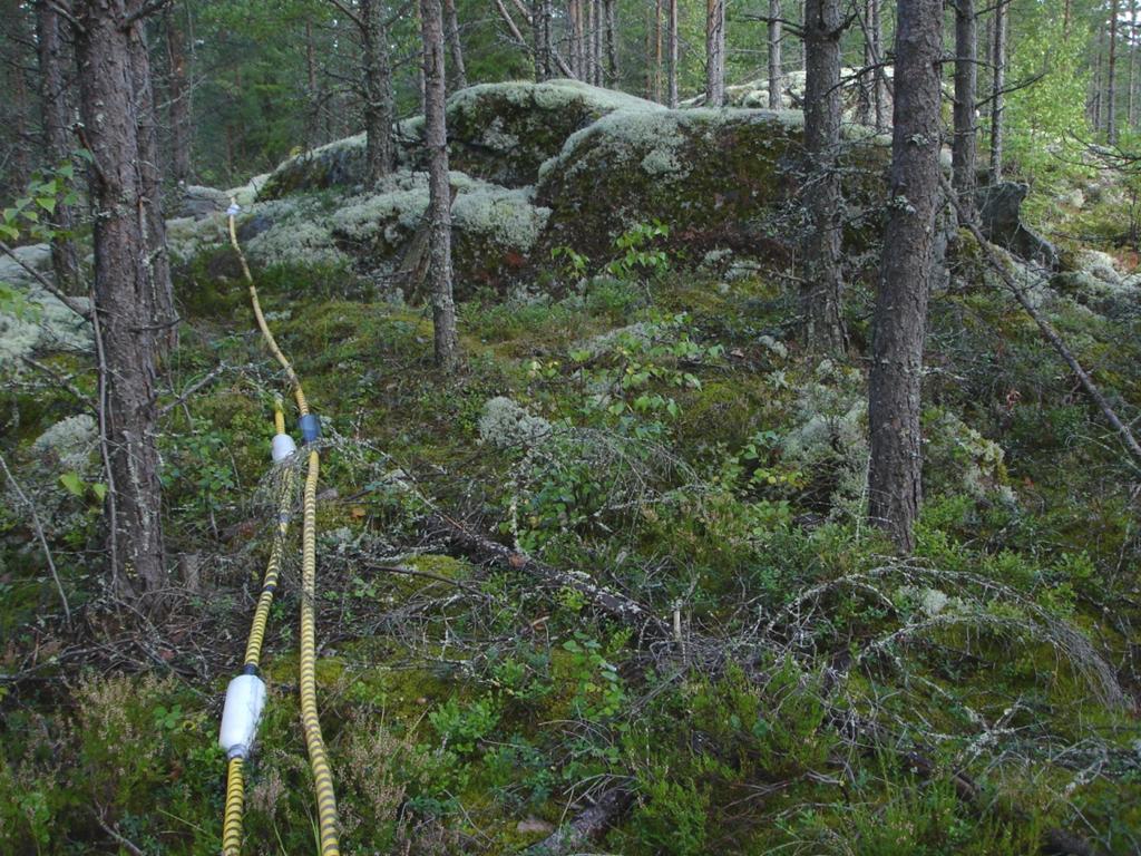 Etelä-Savon kiviaineshuollon turvaaminen 259 Kuva 5. Äijäniemen pohjoisosan kalliopaljastuma.kuva on otettu 24.8.2012. Tapio Väänänen / GTK. Kairaukset Äijäniemen alueelle tehtiin porakonekairausta 4.