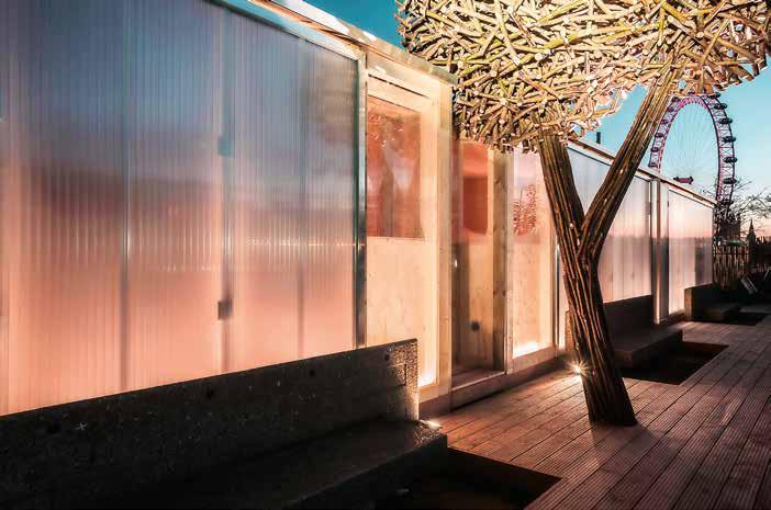 sauna in London Suomalainen sauna hohti iltavalaistuksessa Thames-joen