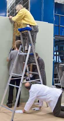 How many City Museum employees does it take to safely hang an Empire mirror to be photographed? At least a furniture conservator, a curator, a museum technician and a photographer.