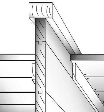 Alimman hirsikerroksen kiinnitys perustuspuihin naulaamalla. Fästning av den nedersta väggtimmervarven i grundbalkarna.