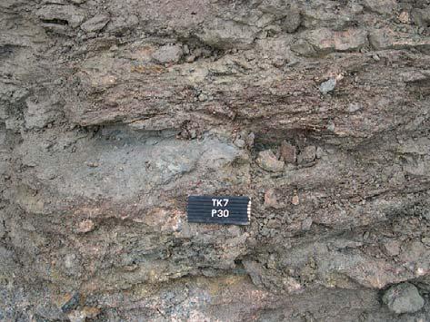 11 Regolith In Sections P29 and P30, an about 2 m thick layer of strongly weathered vein migmatite occurs directly on the unweathered mica gneiss (Fig. 2.1-3A).
