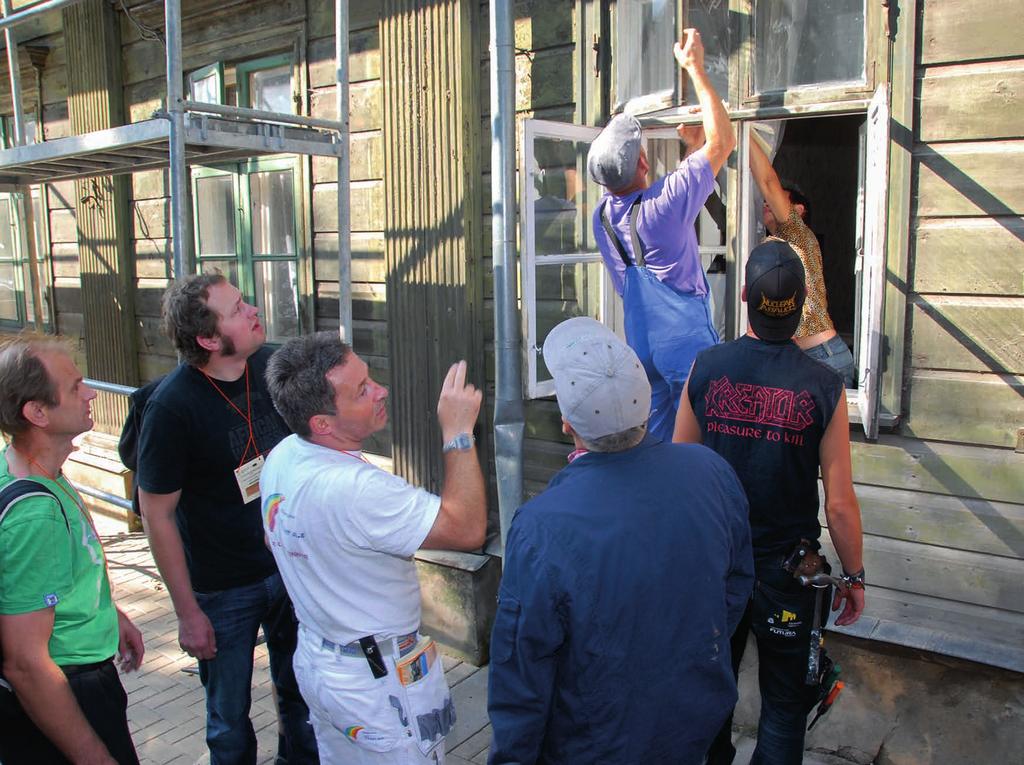 International wood restoration camp 2011. Restoration workshop for wooden facade and its parts for building in 15 1905 Street.