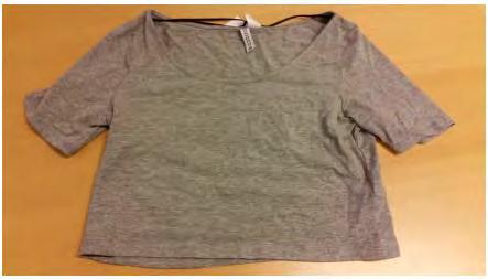 6109 10/ 1. Naisten lyhythihainen T-paita neulosta, joka on 80 % puuvillaa, 14 % viskoosia ja 6 % elastaania. Se on tarkoitettu peittämään ylävartalo ja ulottuu vain vyötärön yläpuolelle asti.